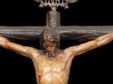 an image of a statue of jesus on a cross with a crown on his head