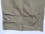 an image of a close up of a pair of pants with buttons on them