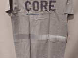 grey t - shirt with core logo on it hanging on a hanger