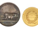 une image représentant une pièce de monnaie sur laquelle figurent un homme et une vache