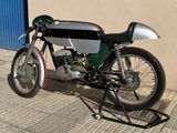 a motorcycle that is parked on the side of the street