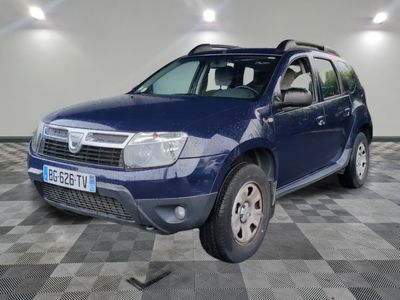 a picture of a blue dacia parked in a garage