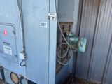 a machine that is sitting outside of a building