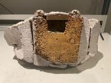 a large piece of concrete with a hole in it