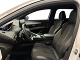 the interior of a white car with black leather seats and steering controls