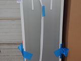 a refrigerator that is sitting in a box in a garage