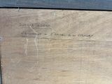 a piece of wood that has writing on it