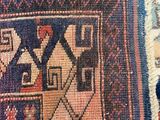 an image of a close up of a rug with a cat laying on it