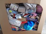 a cardboard box filled with various items that are in it