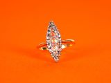 an image of a diamond ring on an orange background