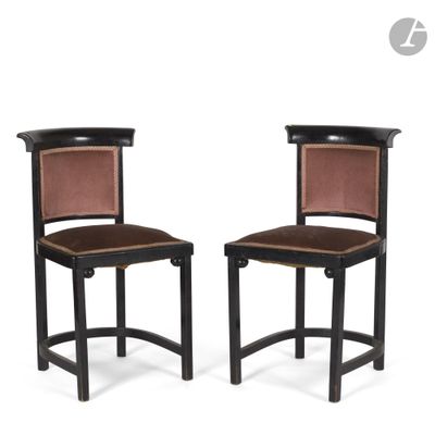 pair of art deco chairs with leather upholstered backrests