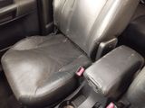 an image of a car seat with a cup holder in it