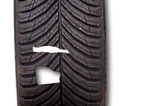 a close up of a tire on a white background