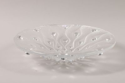 clear glass bowl with a decorative design on the rim