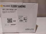 a box of floor sanding sitting on a table