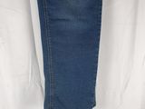 the back of a pair of jeans hanging on a hanger
