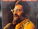 the cover of a cd with a picture of a man with glasses and a beard