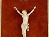 an image of a crucifix with a flag on it