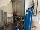 a room with a lot of water tanks in it