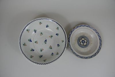 a small bowl and a small bowl sitting on a table