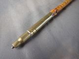 a pen that is laying on top of a table