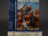 a stack of books with a picture of a woman and a helicopter