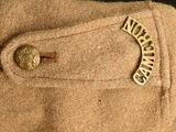 a close up of a button on a jacket