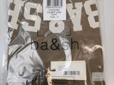 the back of a brown t - shirt with the words ' love ' written on it