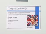 a picture of a certificate with a picture of queen elizabeth on it