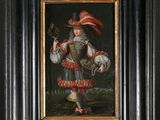 portrait of a man in a red and white outfit holding a guitar