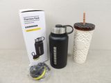 thermos flask with a straw in front of it next to a cup