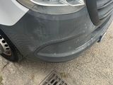 a car that is parked on the side of the street