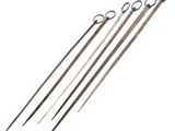 a set of four stainless steel knitting needles on a white background