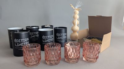 six glasses and a can of cotton gin on the table