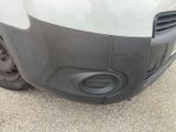 a close up of the front bumper of a van