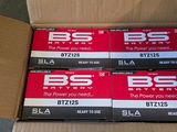 several boxes of b5 batteries are stacked on top of each other