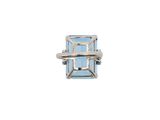 a close up of a ring with a blue stone in it
