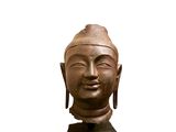 an image of a statue of a buddha head on a white background