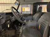 a picture of a car with a steering wheel and a dashboard