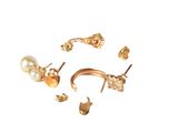 a picture of a group of gold and pearl earrings