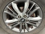 a close up of a tire on the side of the road