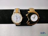 two watches that are sitting on the wrist of each other