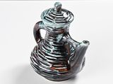 a tea pot that is sitting on a table