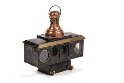 a small metal object that is on top of a table