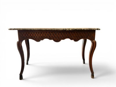 an old table with a marble top on a white background