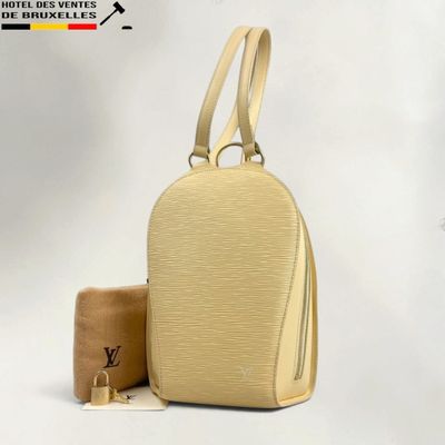 louis vuitton backpack bag in beige
