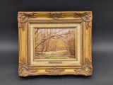 une peinture à l'huile représentant un paysage boisé avec des arbres et un sentier