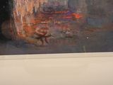 a painting of a man and a dog in a cave