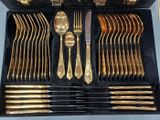 a case that has a set of silverware in it