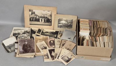 an old photo of a bunch of old photos in a box